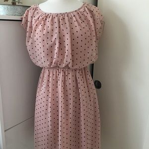 Pale polka dot pink dress.